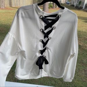 Size medium lace up sweater